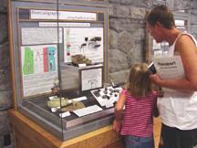 Summer and Diana looking at exhibit